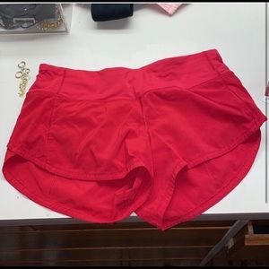Red lululemon shorts